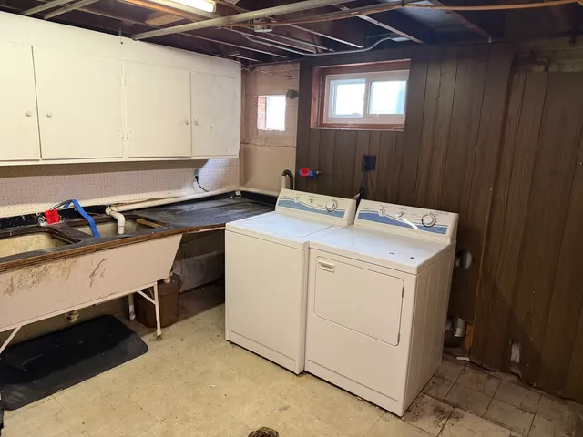 a utility room with dryer and washer