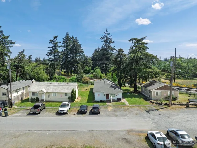 a view of a street with cars