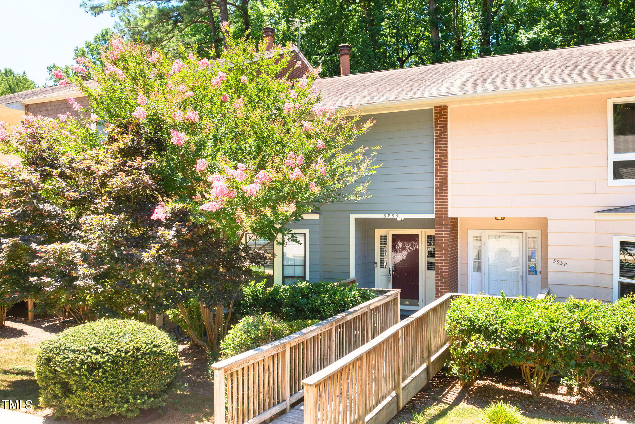 5955 Dixon Drive Raleigh, NC 27609 - Photo 1 of 26 a front view of a house with a yard