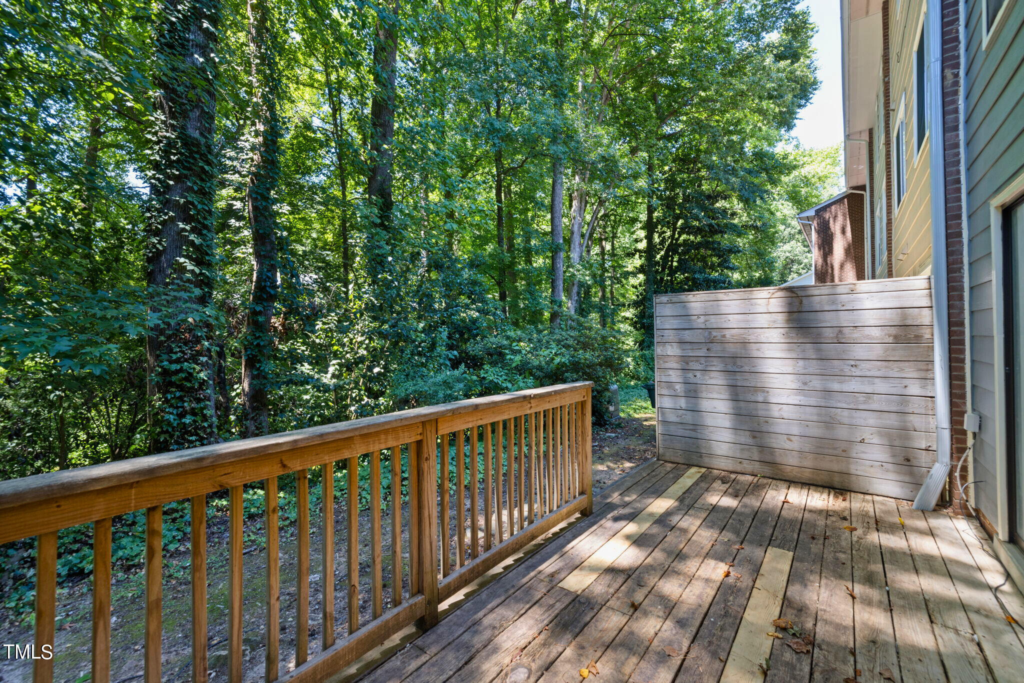 5955 Dixon Drive Raleigh, NC 27609 - Photo 20 of 26 a view of wooden deck
