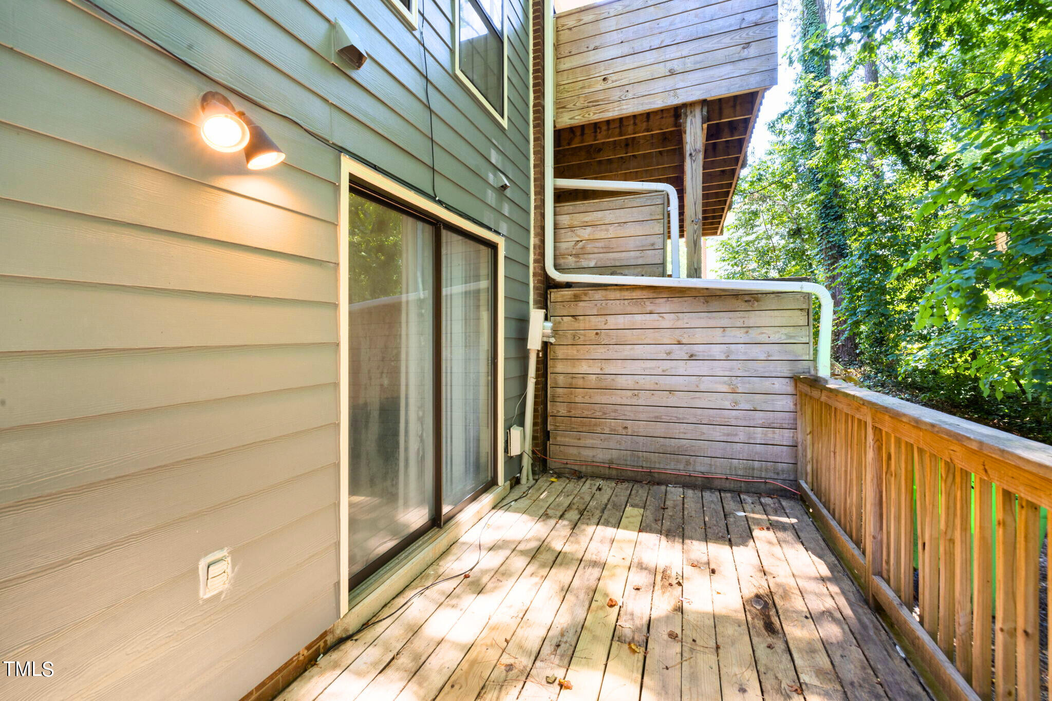 5955 Dixon Drive Raleigh, NC 27609 - Photo 21 of 26 a view of wooden door