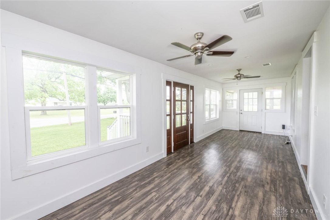 190 Swailes Road Troy, OH 45373 - Photo 25 of 82 This bright living space features durable flooring, ample natural light, and classic architectural elements.