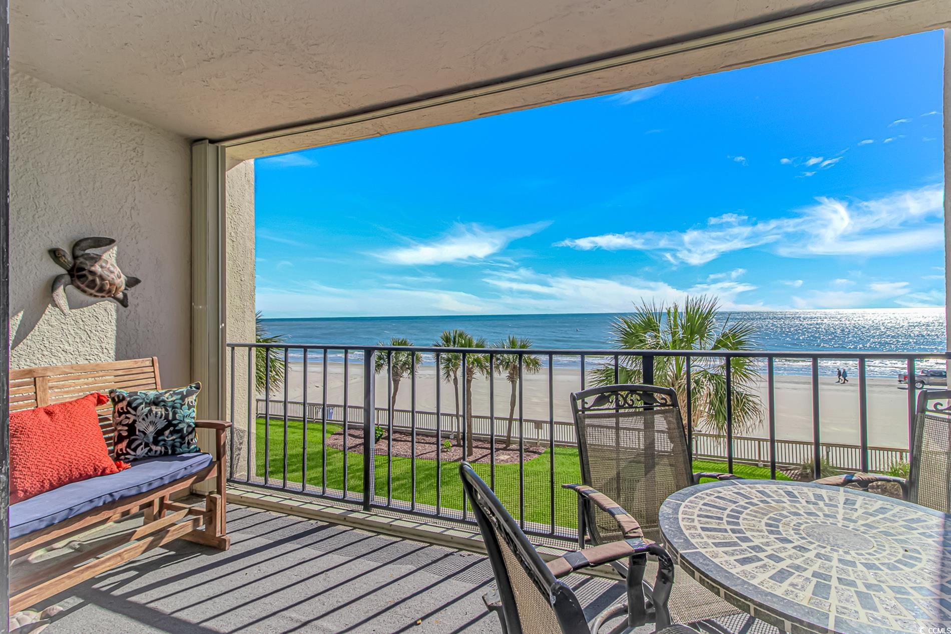 10100 Beach Club Drive, Unit 2B Myrtle Beach, SC 29572 - Photo 20 of 30 Balcony featuring view of water and beach