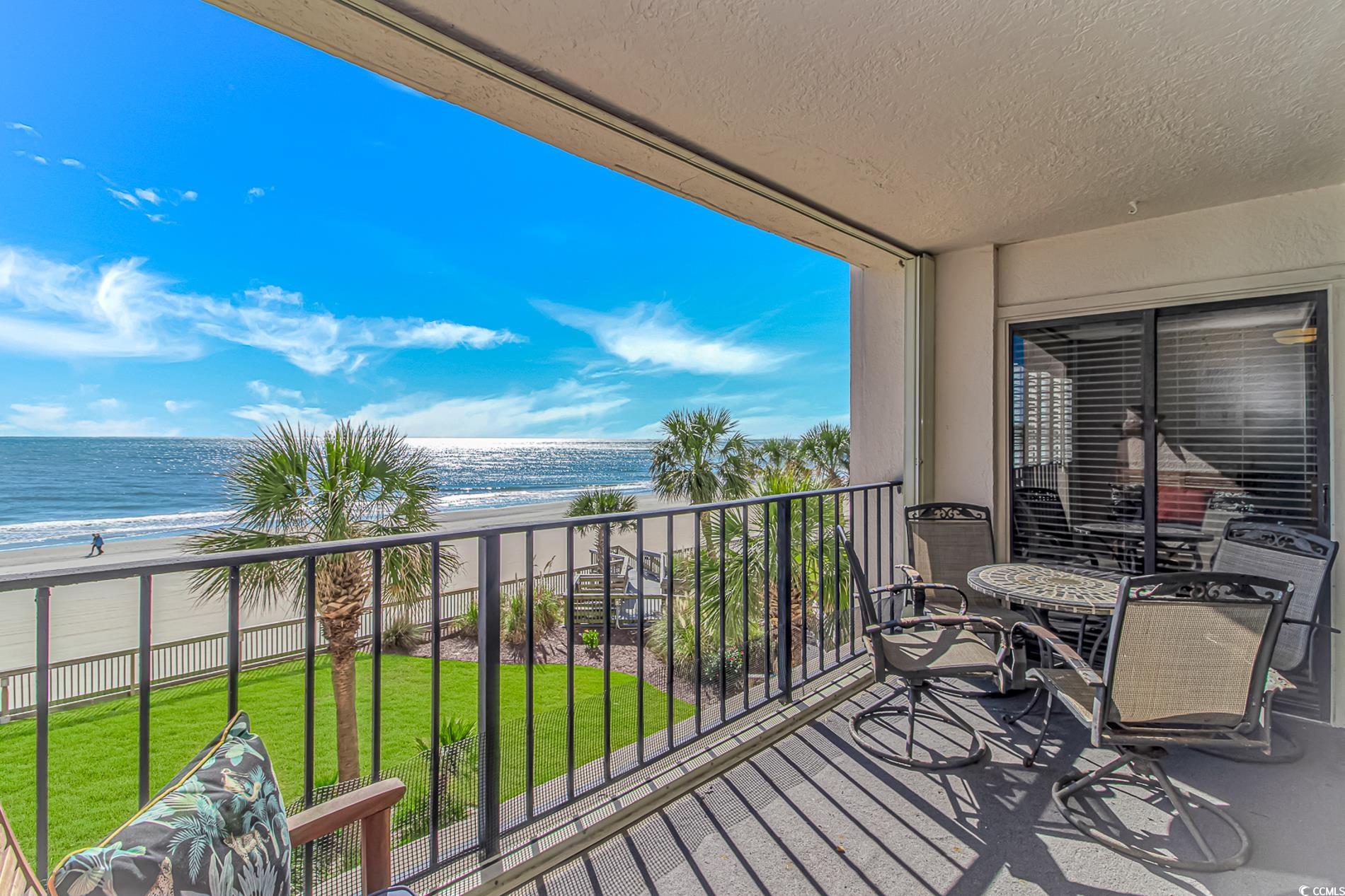 10100 Beach Club Drive, Unit 2B Myrtle Beach, SC 29572 - Photo 21 of 30 Balcony with view of water and beach