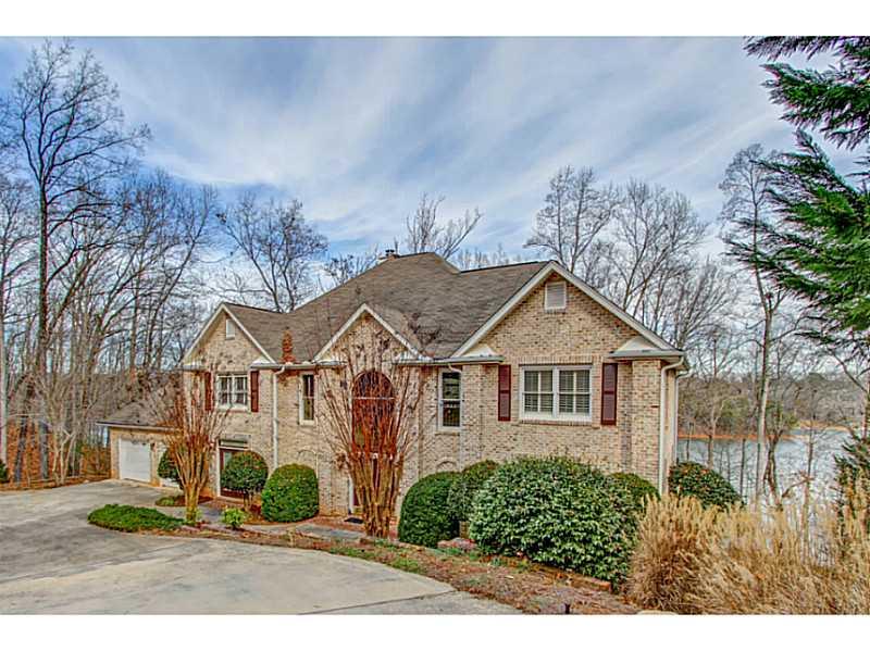 1039 Farmhouse Road Gainesville, GA 30506 - Photo 1 of 1 Exterior Front. Lakefront luxury in sought-after country club