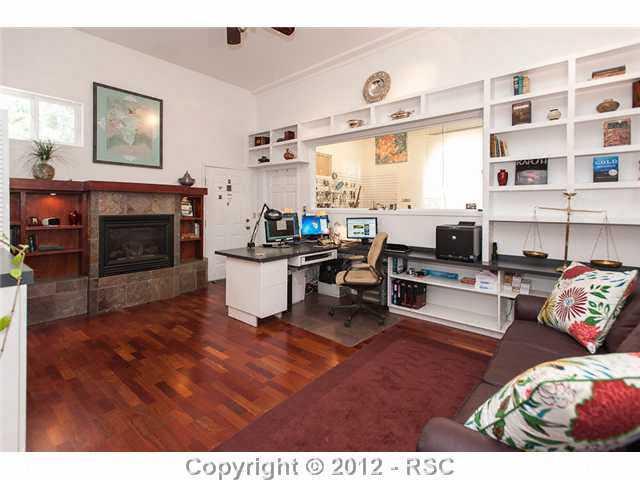 5610 Timpa Road Cascade, CO 80809 - Photo 15 of 16 This 400 Sq ft room (included in Main level square footage) has engineered Cherry wood floors, gas fireplace, half bath, built in shelving and separate outside entrance (or thru garage). Might make a great 'mancave', office or 4th BR?