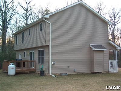 79 Turkey Ridge Kunkletown, PA 18058 - Photo 4 of 4 a view of a house with a yard and patio