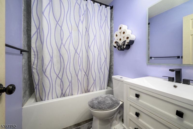 920 Robin Road Hillsborough, NJ 08844 - Photo 15 of 29 a bathroom with a sink toilet and tub