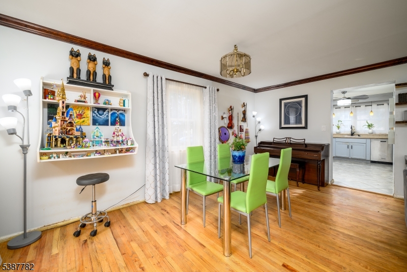 920 Robin Road Hillsborough, NJ 08844 - Photo 6 of 29 a view of a dining room with furniture and wooden floor
