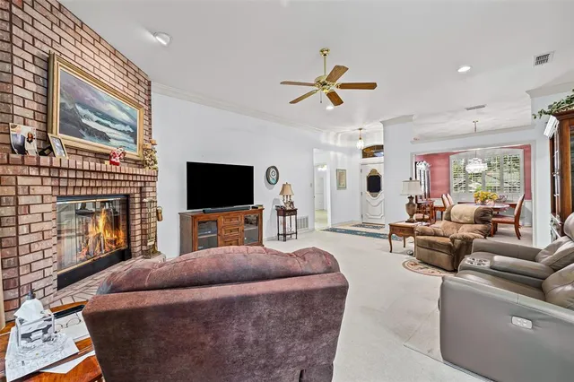 a kitchen with stainless steel appliances granite countertop a refrigerator and a stove
