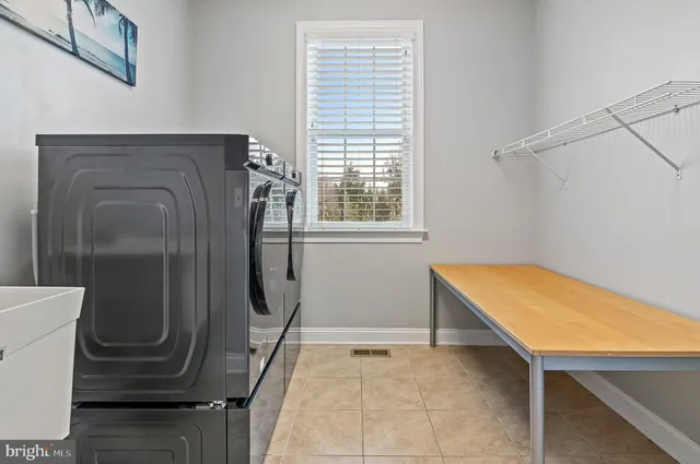 a view of a swimming pool with outdoor seating