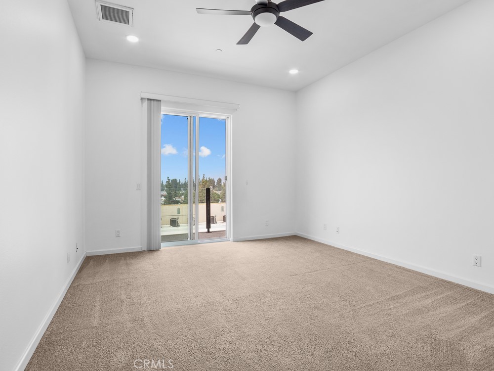 568 Vía Pueblo Riverside, CA 92507 - Photo 32 of 46 Upstairs bedroom with fan and can lighting