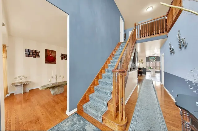 a view of a living room and entryway