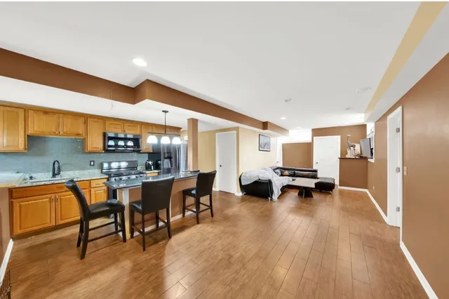 a view of a kitchen and dining room