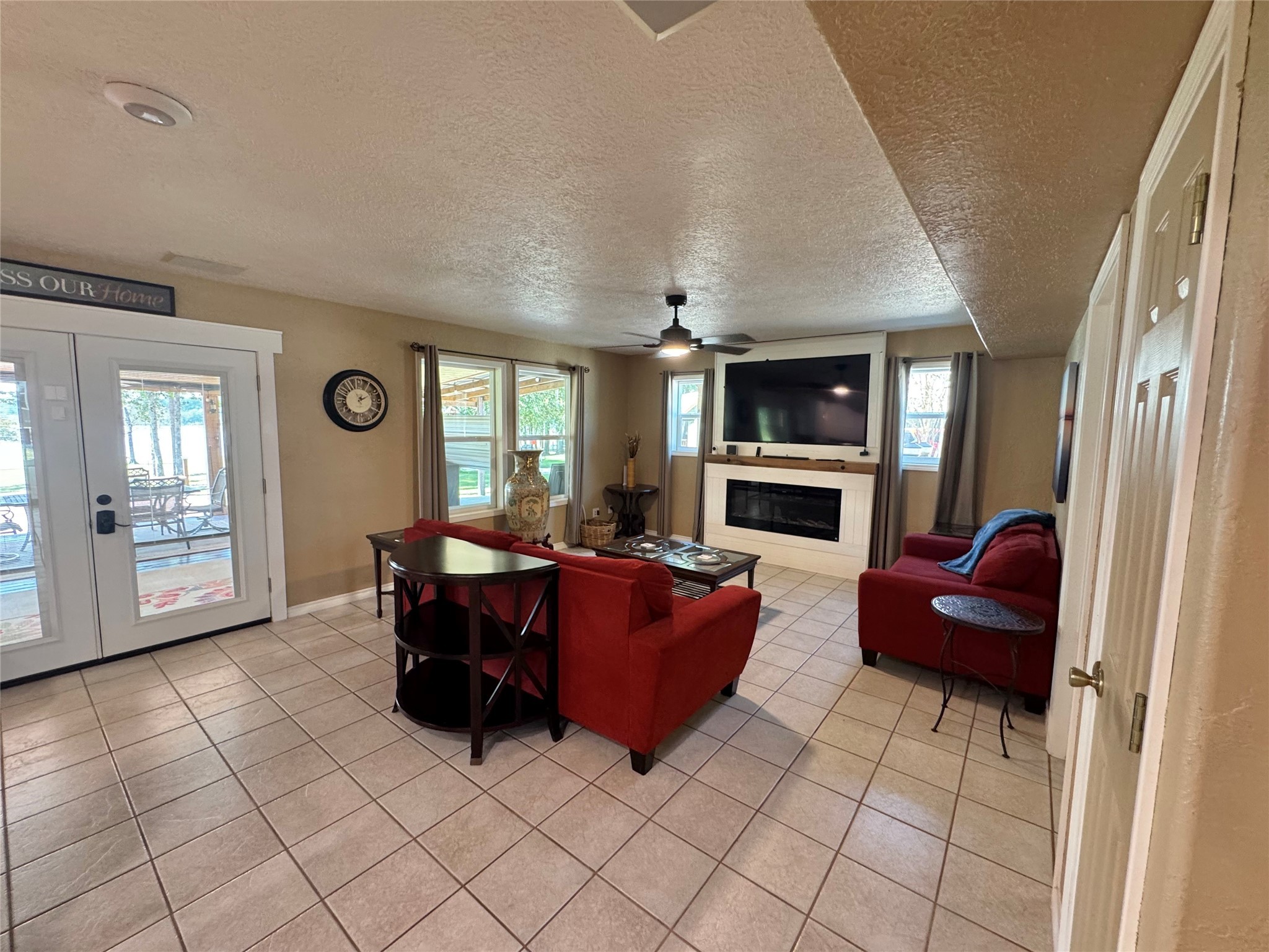 763 Mill Creek Acres Road Brookeland, TX 75931 - Photo 11 of 50 a living room with furniture and a fireplace