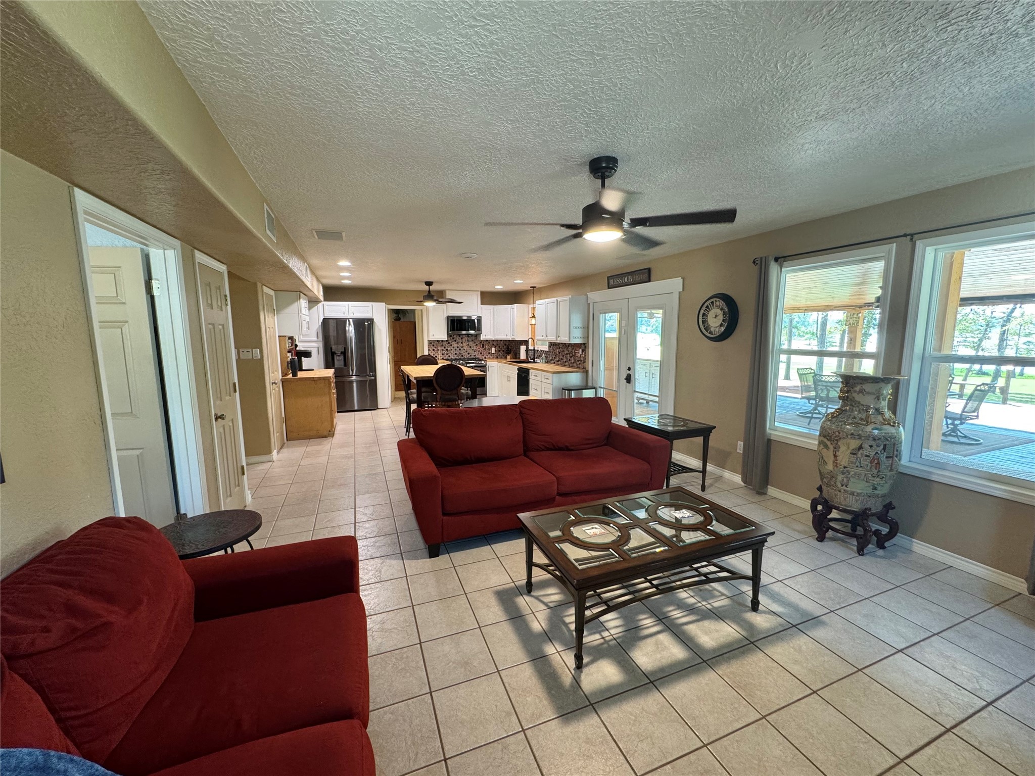 763 Mill Creek Acres Road Brookeland, TX 75931 - Photo 13 of 50 a living room with furniture and a large window