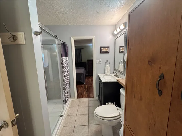 a bathroom with a sink and toilet
