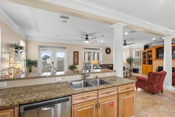 a view of living room with granite countertop furniture and fireplace