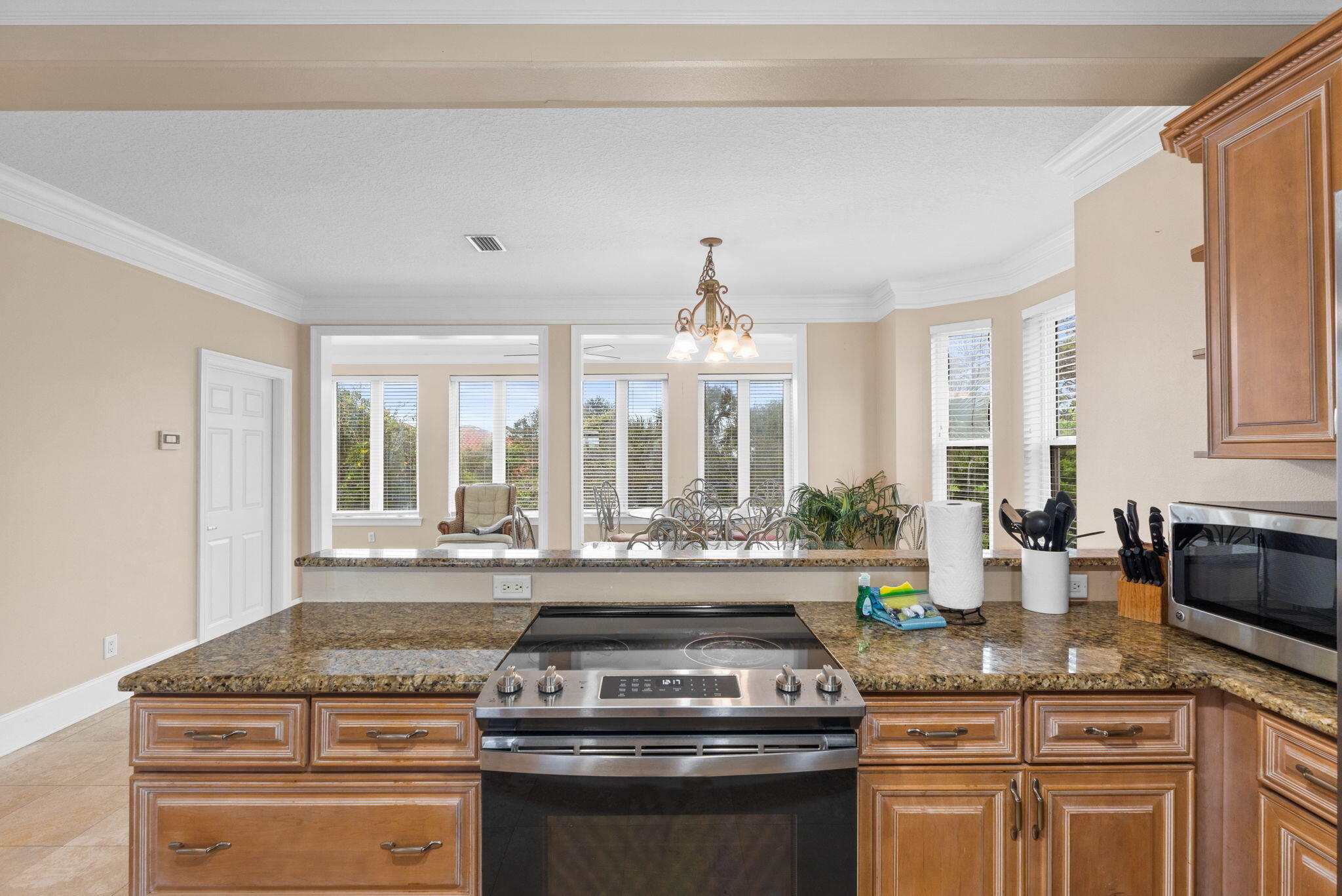 56 Terra Cotta Way Destin, FL 32541 - Photo 14 of 50 a kitchen with stove and cabinets