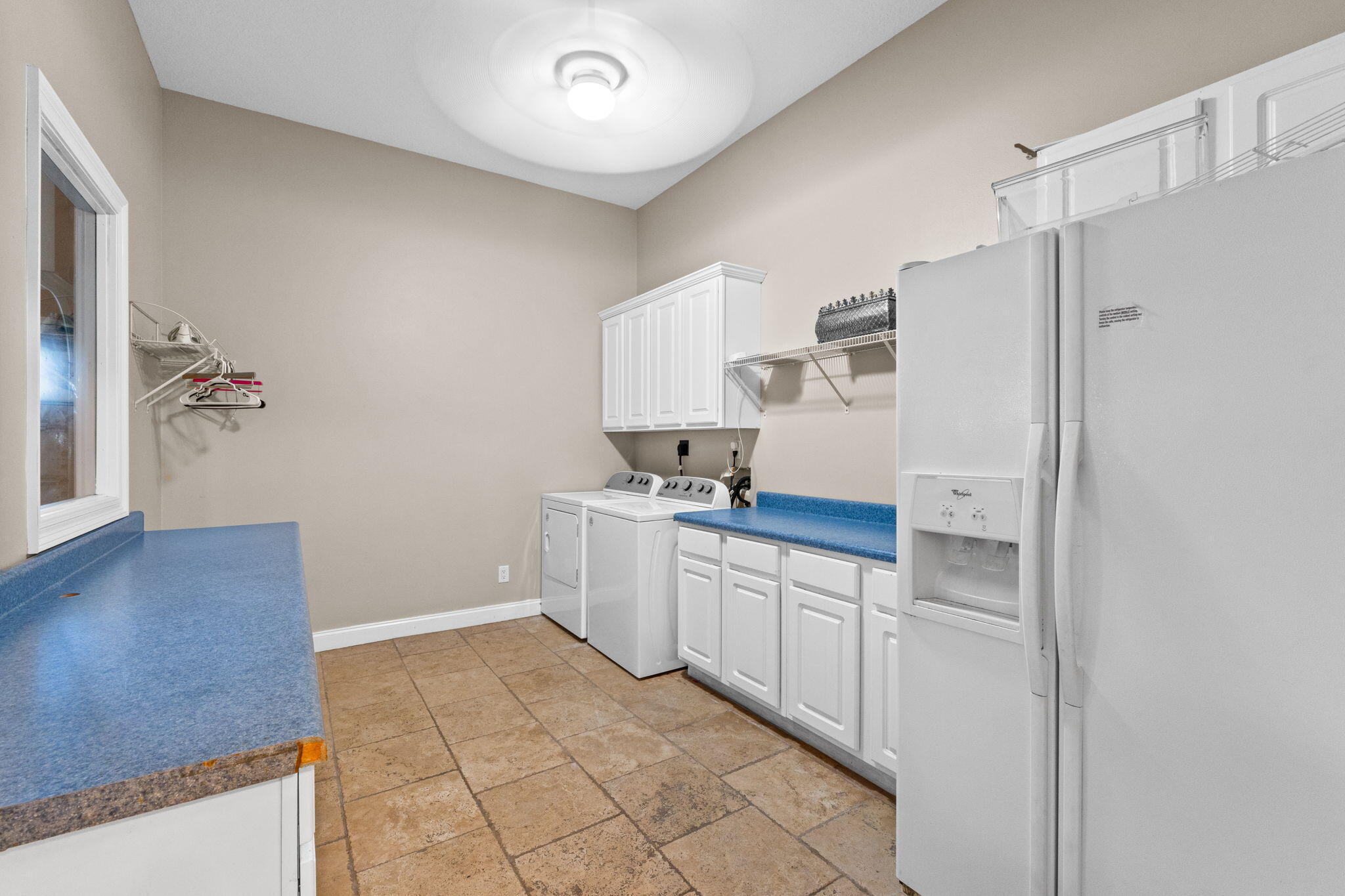 56 Terra Cotta Way Destin, FL 32541 - Photo 23 of 50 a kitchen with a refrigerator and a sink