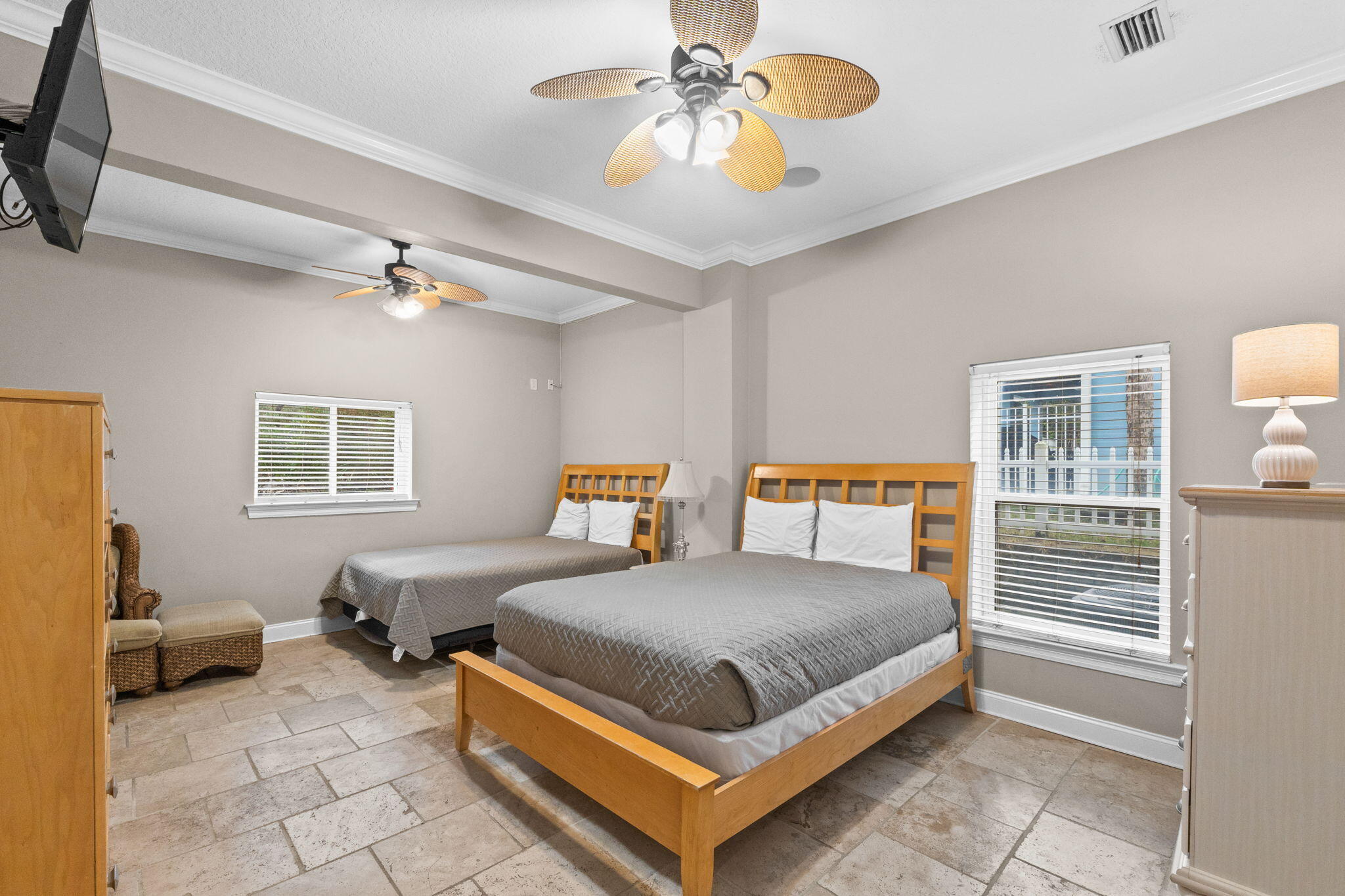 56 Terra Cotta Way Destin, FL 32541 - Photo 24 of 50 a bedroom with a bed and a chandelier