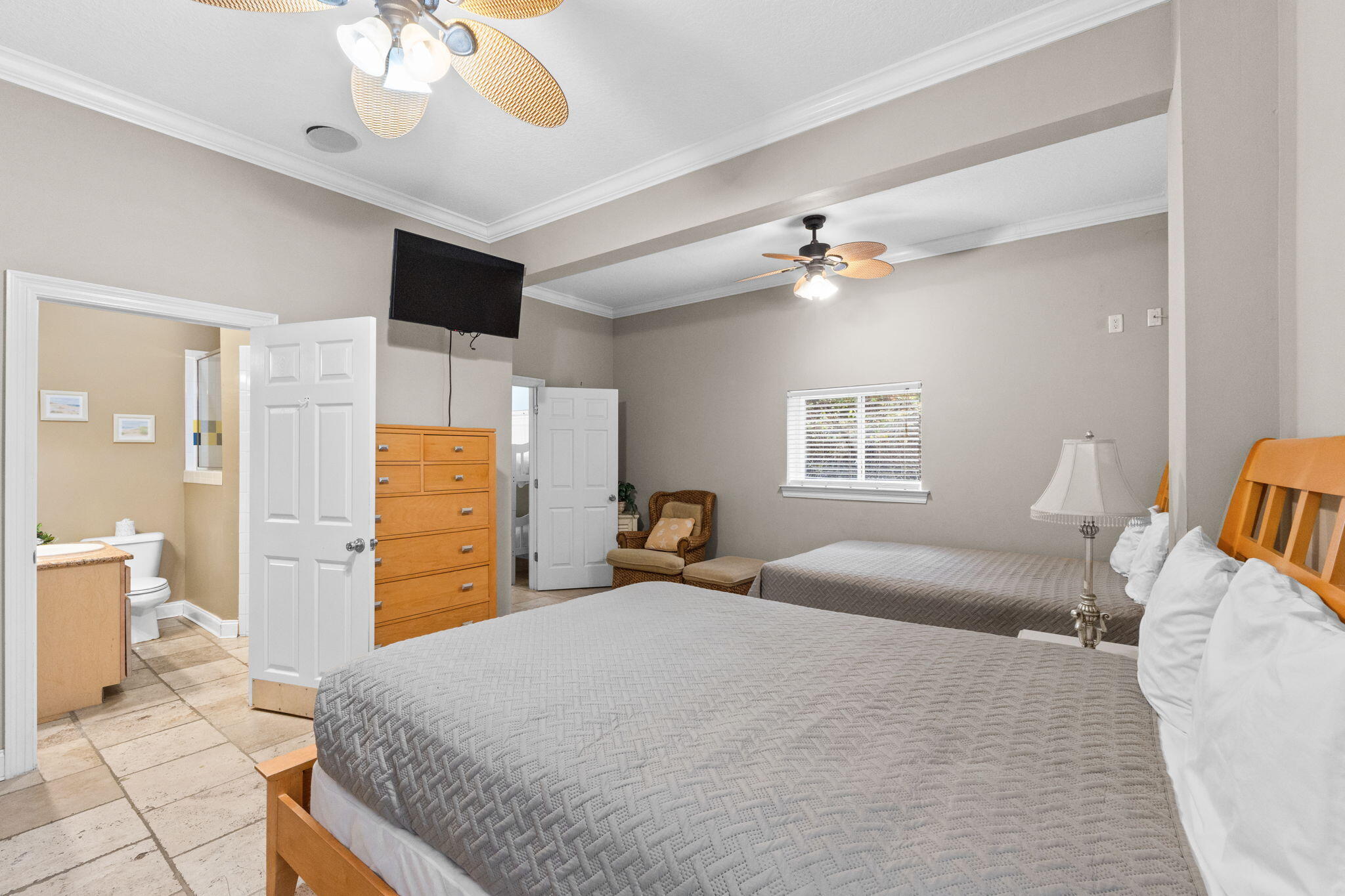 56 Terra Cotta Way Destin, FL 32541 - Photo 25 of 50 a bedroom with a bed and a chandelier