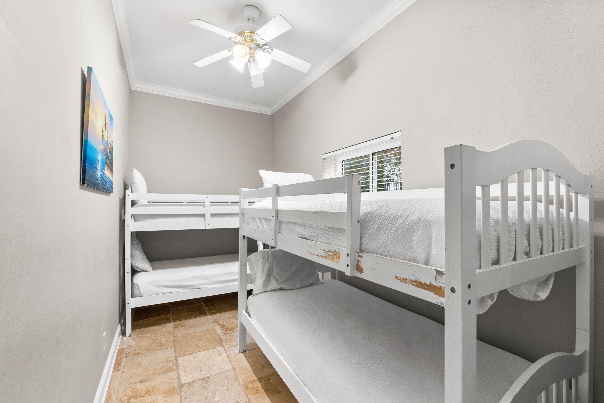 56 Terra Cotta Way Destin, FL 32541 - Photo 29 of 50 a bedroom with furniture and a chandelier