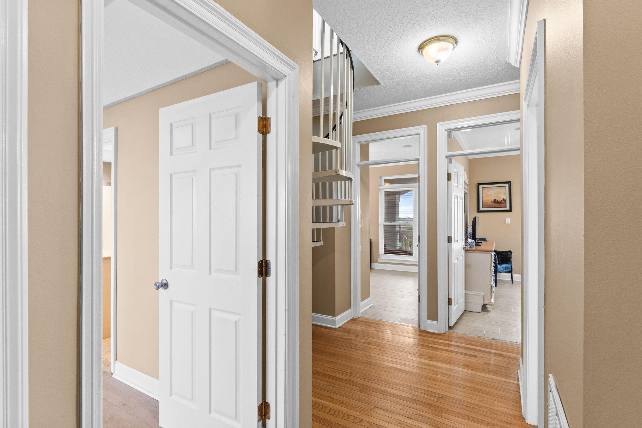 56 Terra Cotta Way Destin, FL 32541 - Photo 30 of 50 a view of a hallway with wooden floor