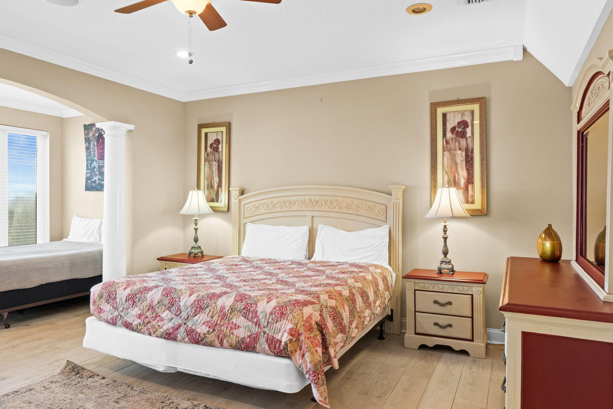 56 Terra Cotta Way Destin, FL 32541 - Photo 31 of 50 a bedroom with a bed and wooden floor