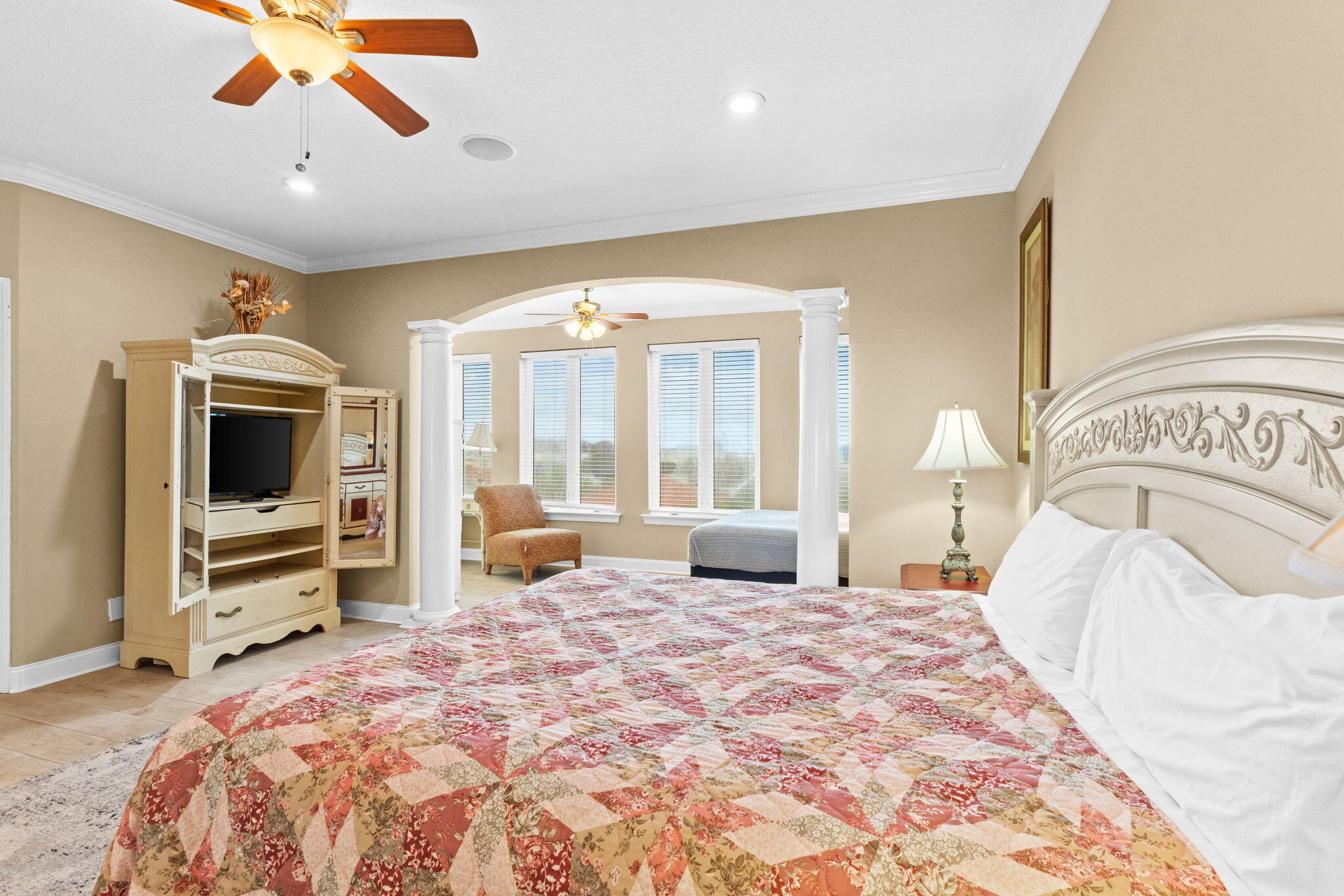 56 Terra Cotta Way Destin, FL 32541 - Photo 33 of 50 a spacious bedroom with a large bed and a flat tv screen