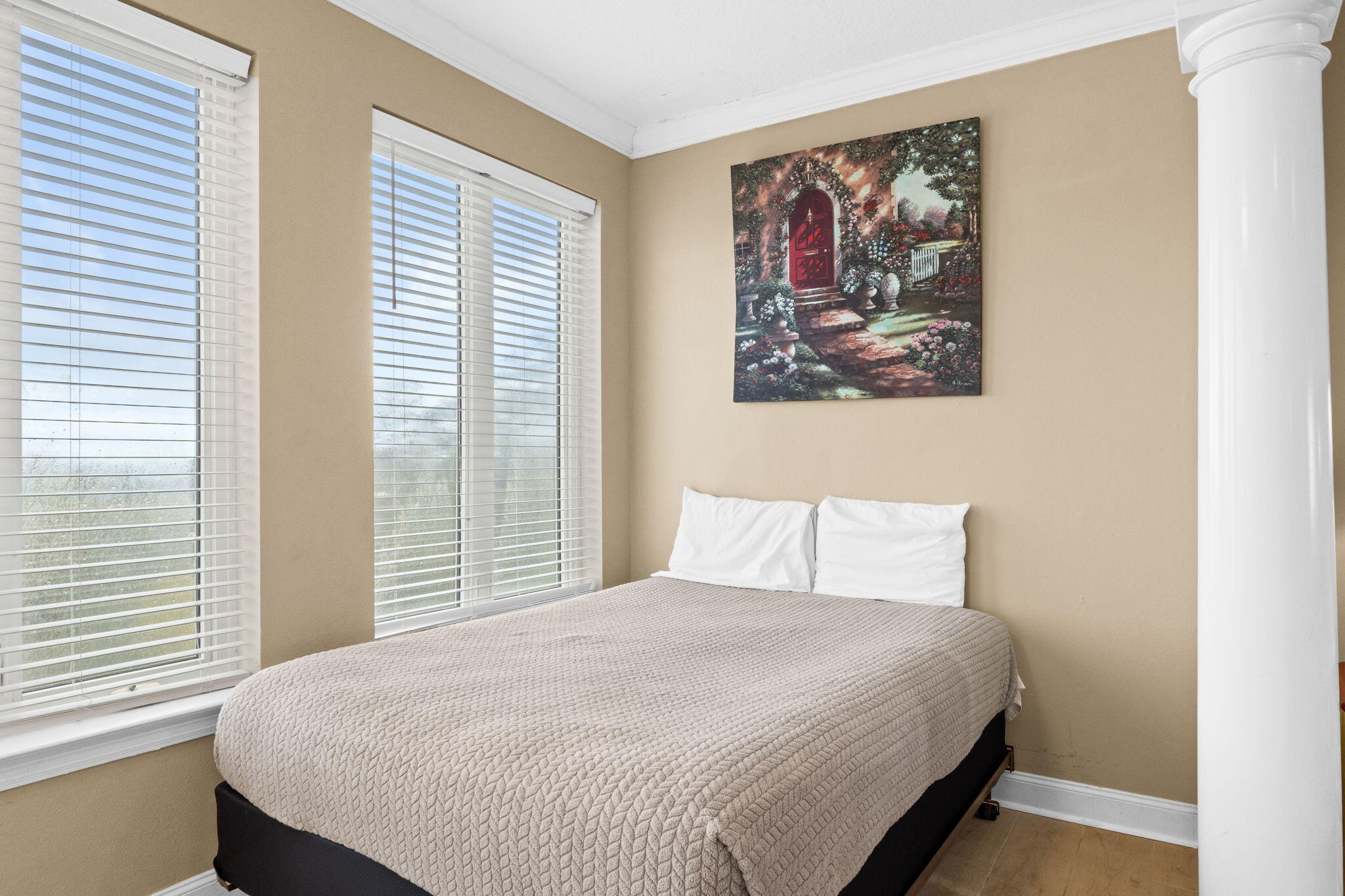 56 Terra Cotta Way Destin, FL 32541 - Photo 34 of 50 a bedroom with a bed and a painting on the wall