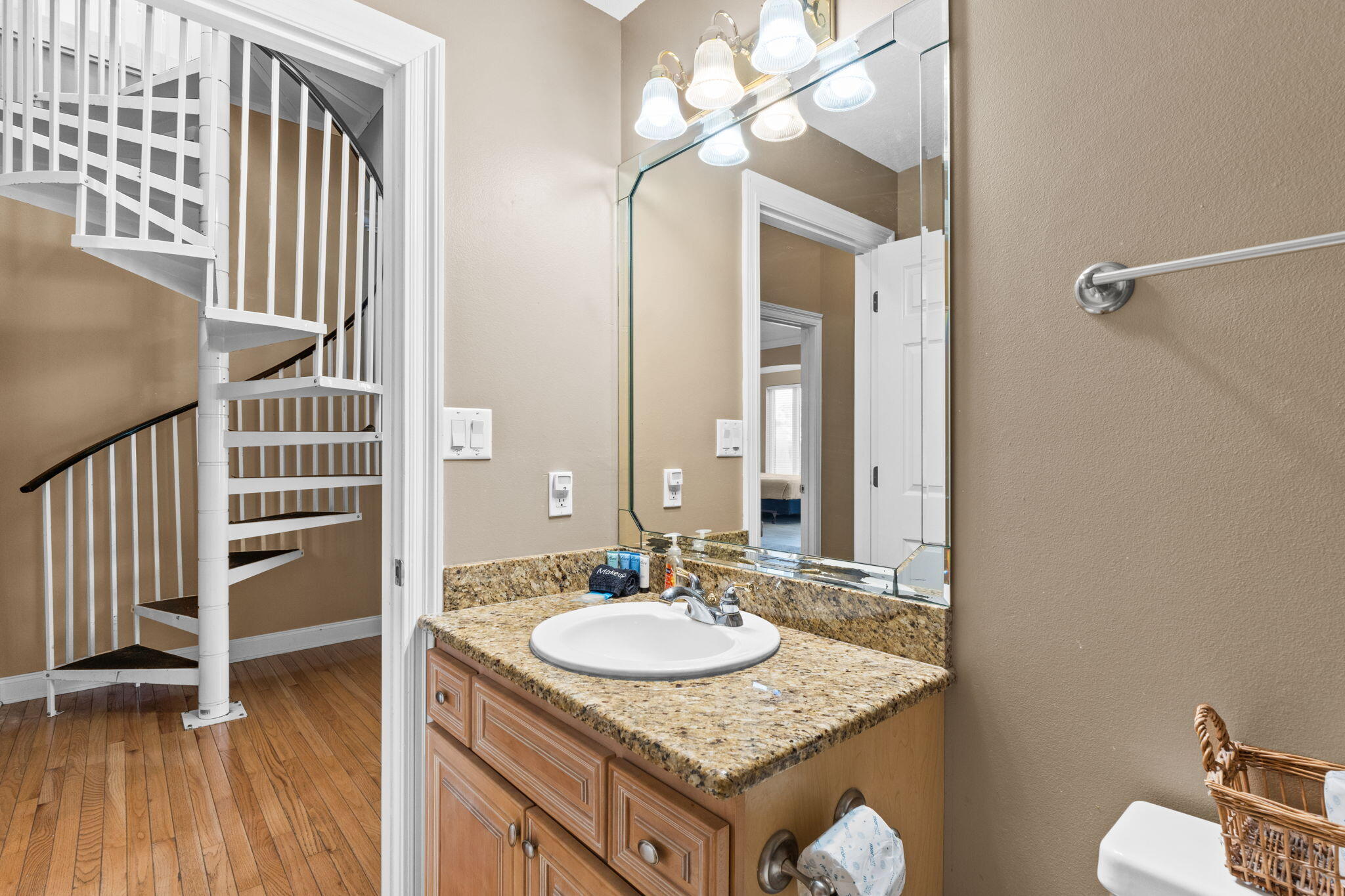 56 Terra Cotta Way Destin, FL 32541 - Photo 40 of 50 a bathroom with a granite countertop sink a mirror and a toilet