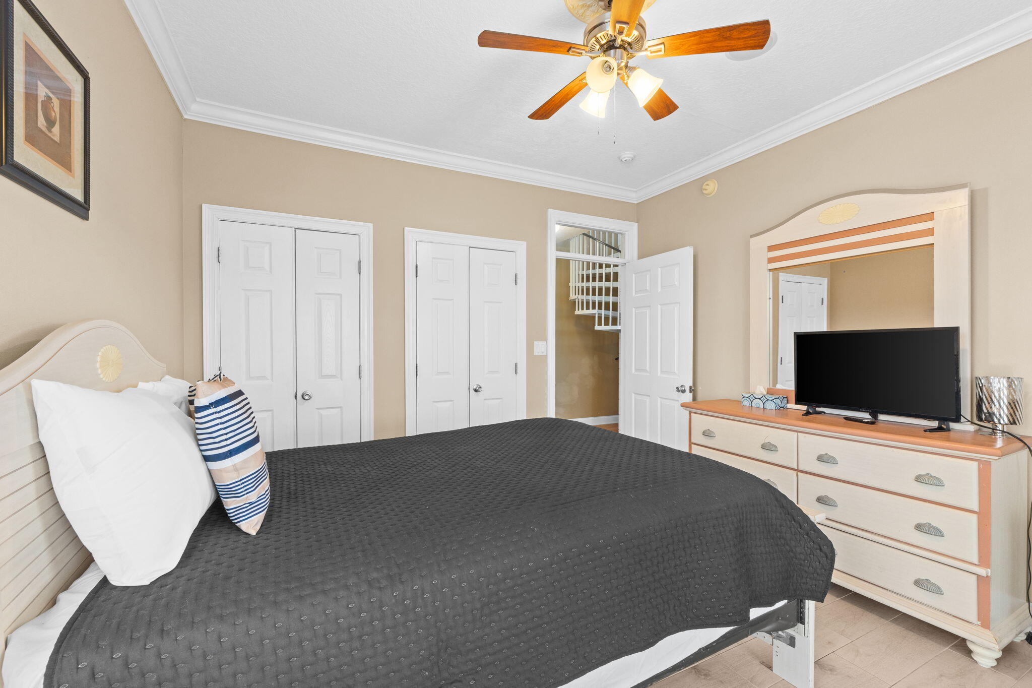 56 Terra Cotta Way Destin, FL 32541 - Photo 42 of 50 a bedroom with a bed and a flat screen tv