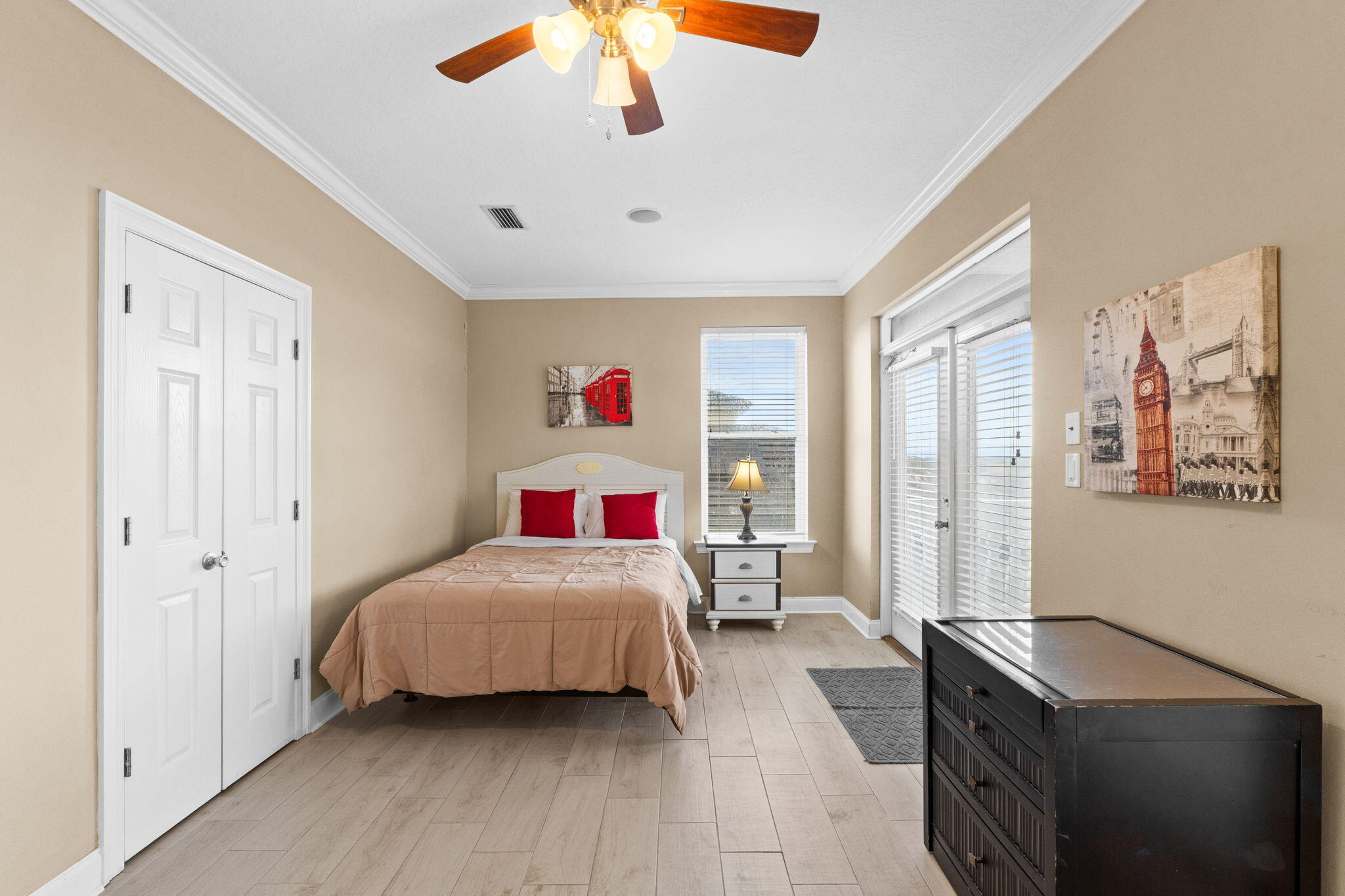 56 Terra Cotta Way Destin, FL 32541 - Photo 43 of 50 a bedroom with a bed and a chandelier