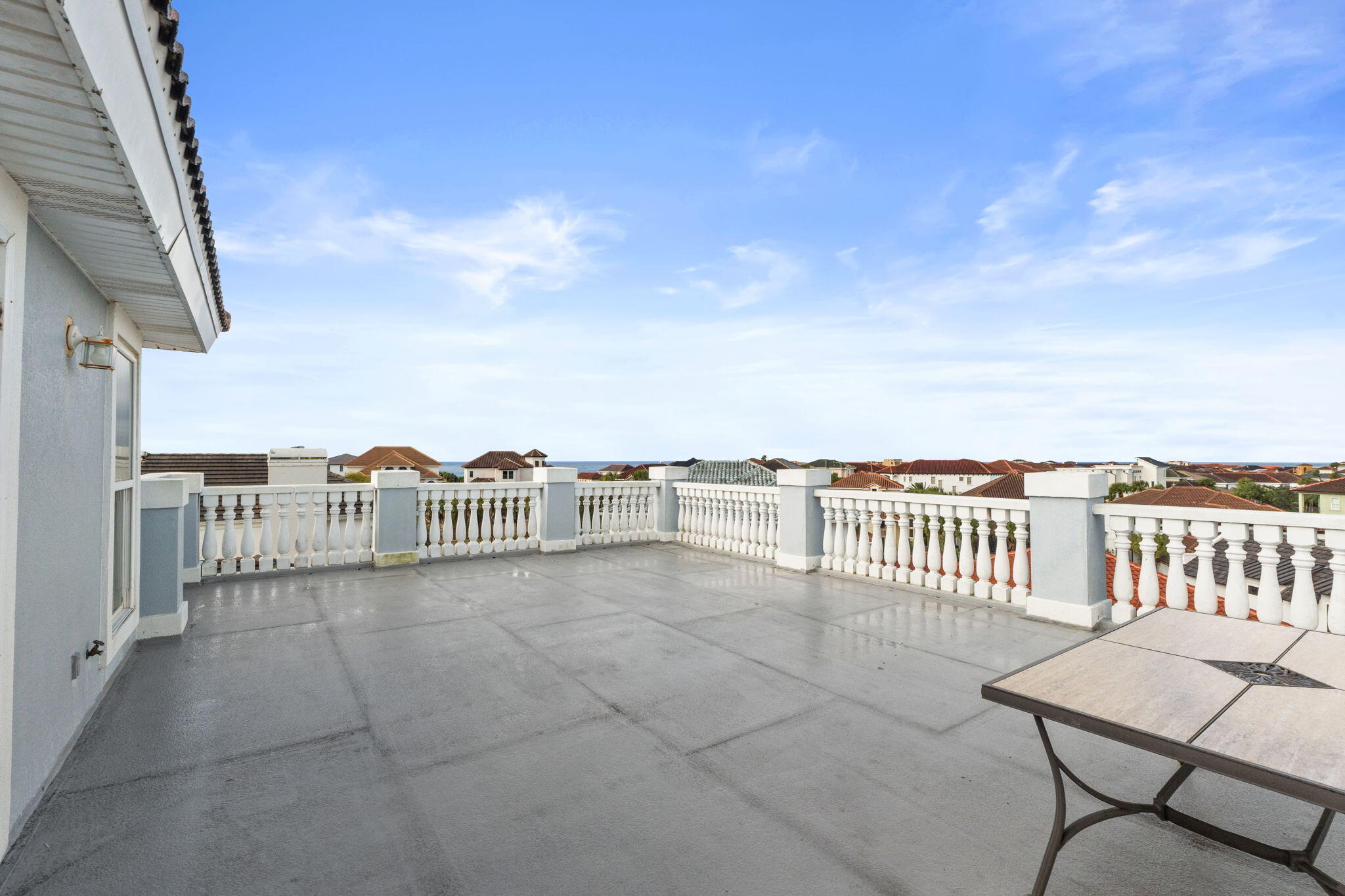 56 Terra Cotta Way Destin, FL 32541 - Photo 48 of 50 a view of a balcony with an outdoor seating