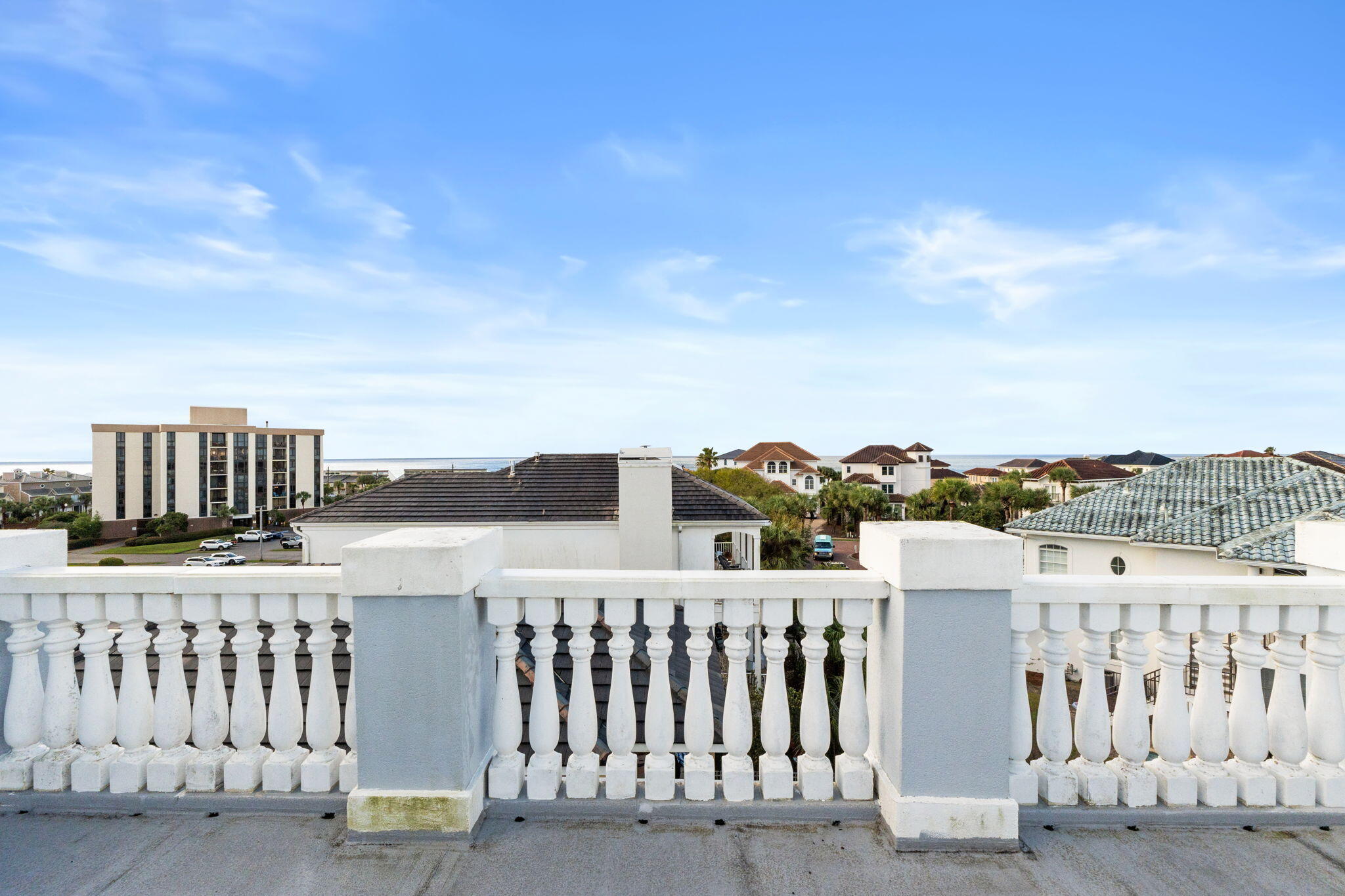 56 Terra Cotta Way Destin, FL 32541 - Photo 50 of 50 a view of a balcony with wooden fence