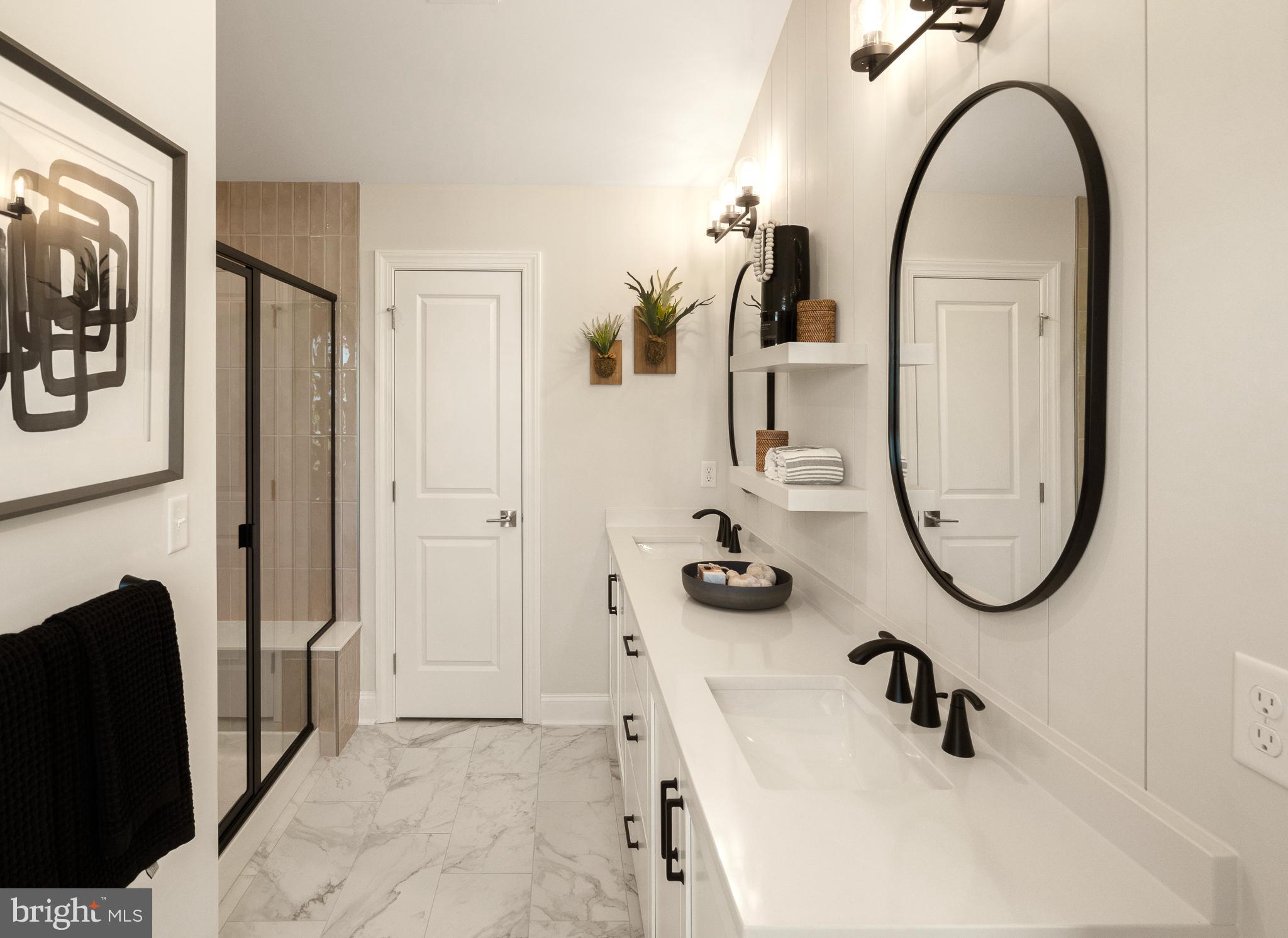 18 Baldwin Way Sellersville, PA 18960 - Photo 10 of 21 a bathroom with a sink and a mirror