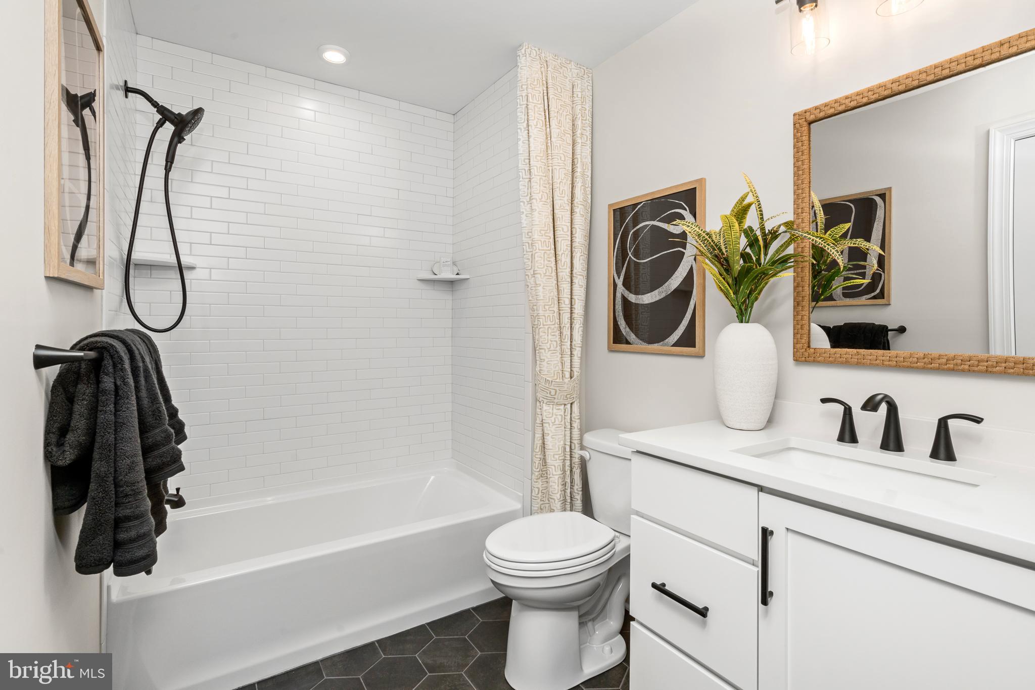 18 Baldwin Way Sellersville, PA 18960 - Photo 17 of 21 a bathroom with a sink a toilet and a shower