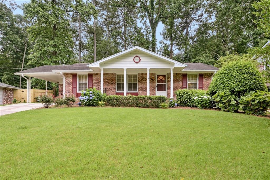 2527 Asbury Court Decatur, GA 30033 - Photo 1 of 1 a front view of a house with garden