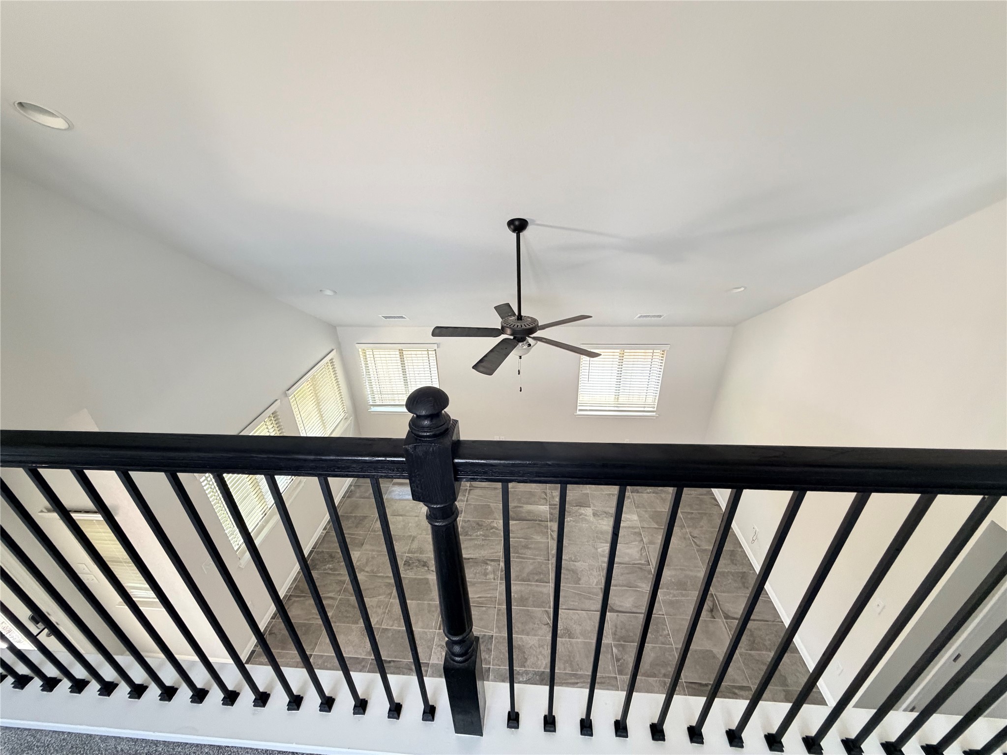 2813 Hopi Path, Unit 11 Leander, TX 78641 - Photo 8 of 17 Stairway with a ceiling fan