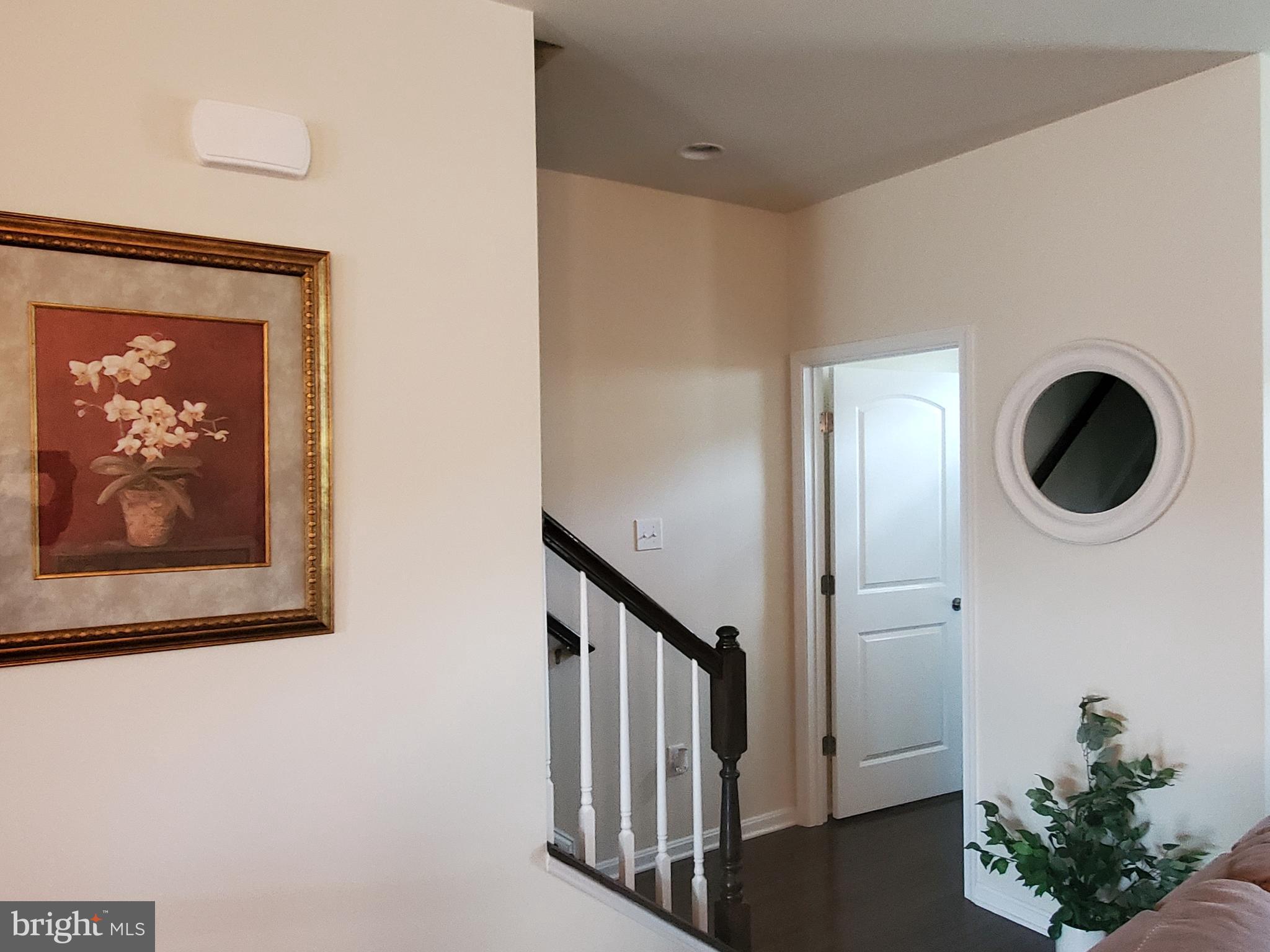 7409 Four Gardens Road Brandywine, MD 20613 - Photo 17 of 39 Main Level Stairway