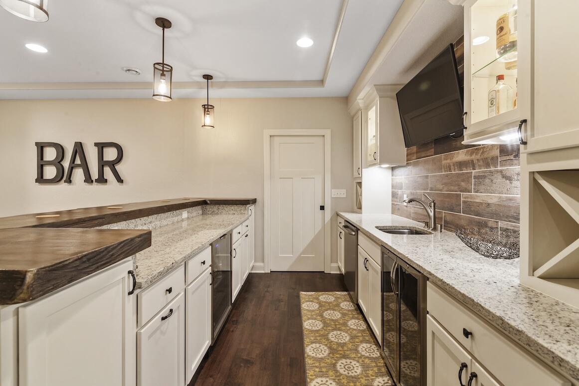 739 Stepping Stone Way Pewaukee, WI 53072 - Photo 66 of 88 Basement Bar with Built-In Cabinetry