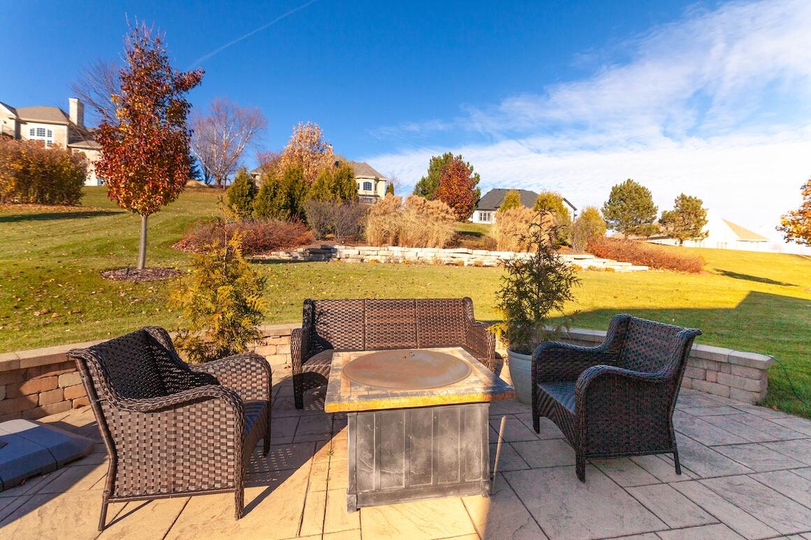739 Stepping Stone Way Pewaukee, WI 53072 - Photo 77 of 88 Back Patio Seating Area