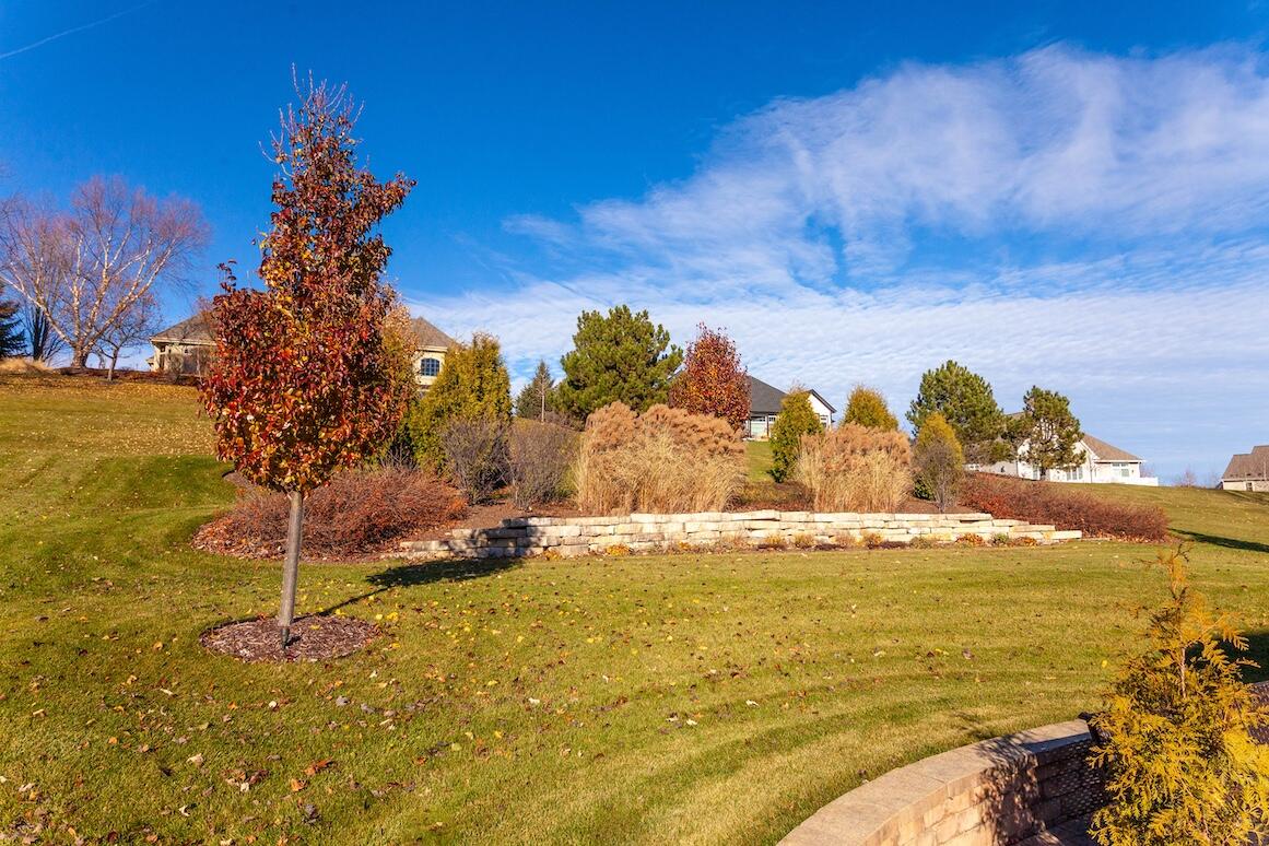 739 Stepping Stone Way Pewaukee, WI 53072 - Photo 79 of 88 Backyard Lawn View