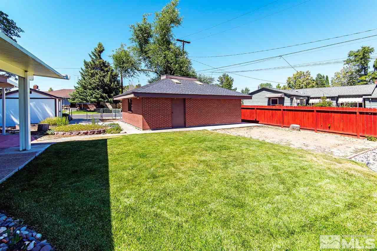 610 Robin Street Reno, NV 89509 - Photo 20 of 23 a view of an house with backyard space and balcony
