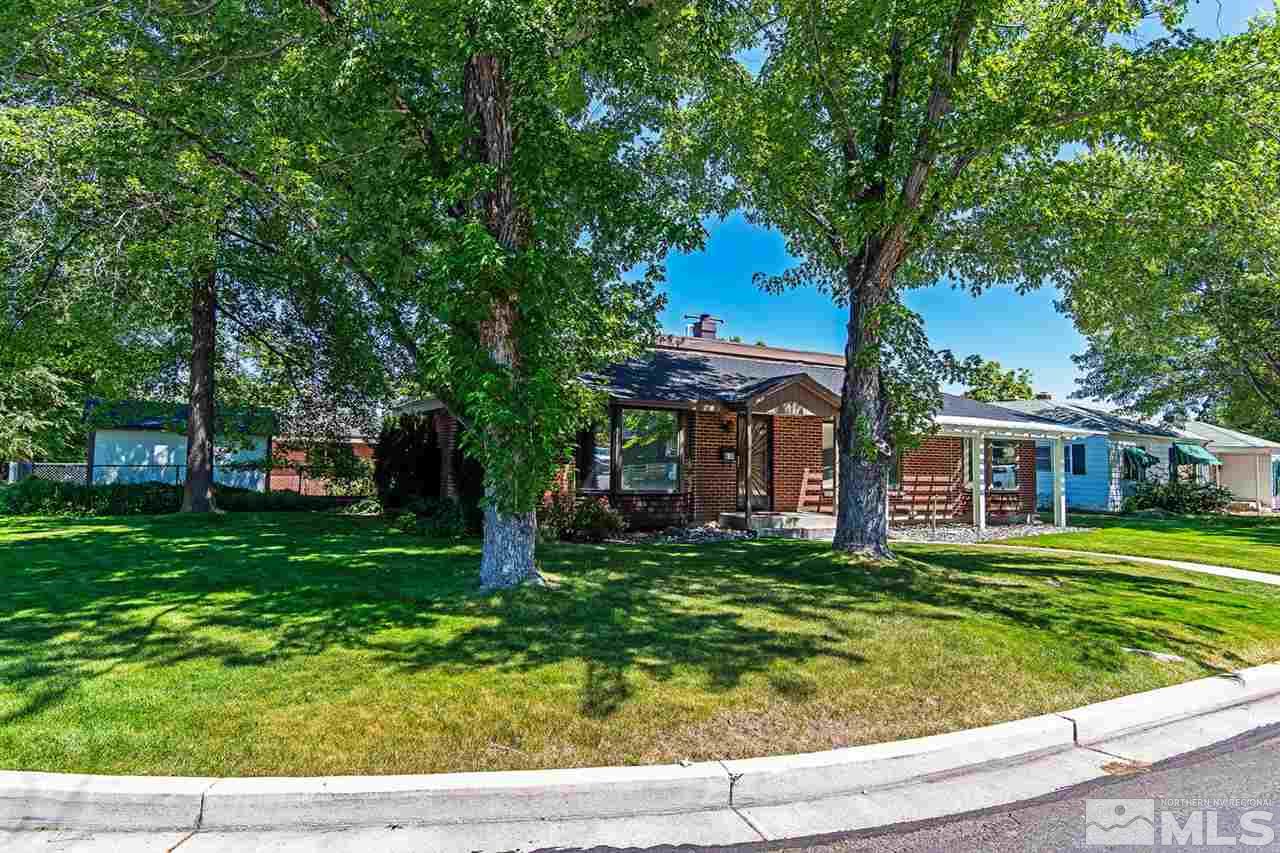 610 Robin Street Reno, NV 89509 - Photo 3 of 23 a front view of a house with a yard