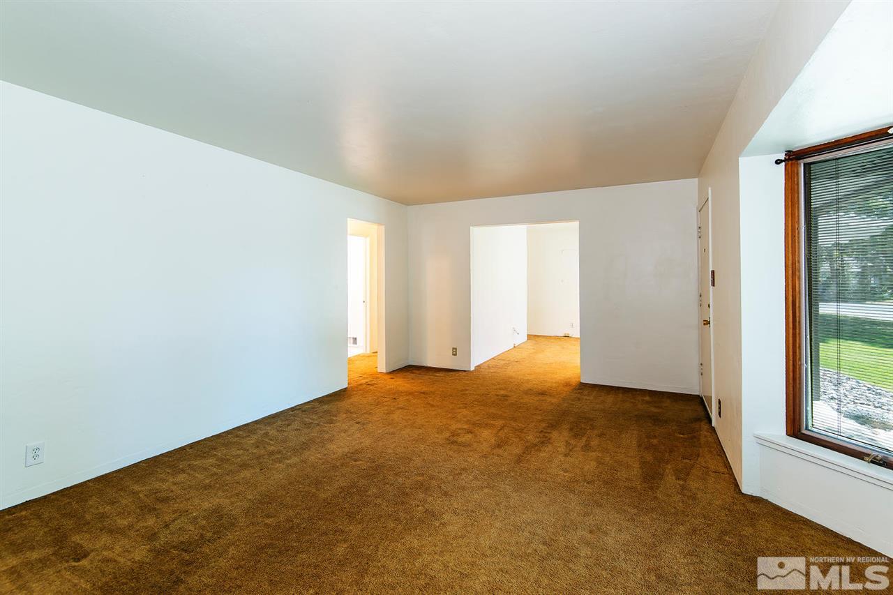 610 Robin Street Reno, NV 89509 - Photo 5 of 23 a view of an empty room with a window