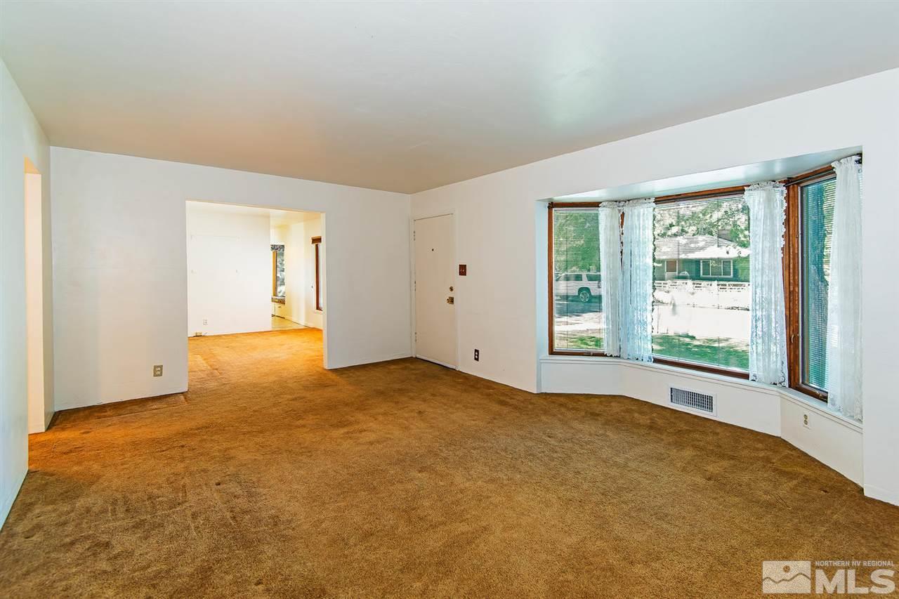 610 Robin Street Reno, NV 89509 - Photo 6 of 23 a view of an empty room with a window