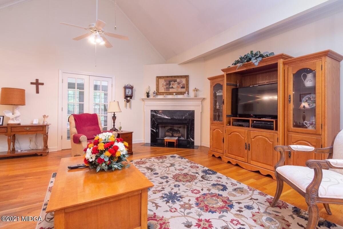 7471 Rivoli Road Macon, GA 31210 - Photo 11 of 26 a living room with furniture and a flat screen tv