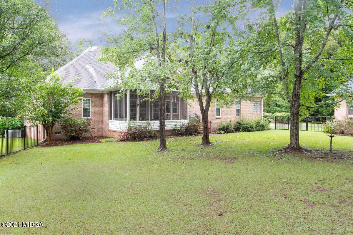 7471 Rivoli Road Macon, GA 31210 - Photo 26 of 26 a view of a house with a backyard and tree